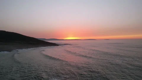 Flying back to the beach with the sunset Stock Footage 230449569