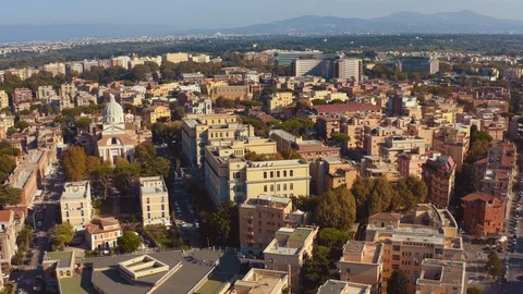 Flying back on drone aerial view over residential areas and houses in Rome Stock Footage 119230487