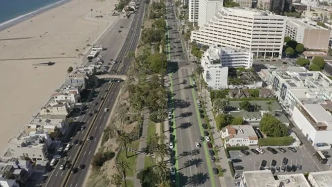 Flying back over Santa monica above ocean ave between the beach and downtown Stock-Footage 133843545