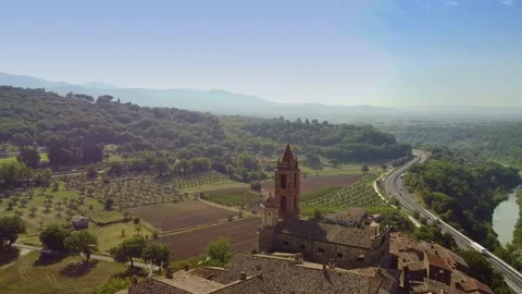 Flying backward over Tuscany old buildings in Italy. Stock Footage 143358772