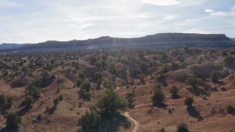 Flying backwards and away from desert landscape at Devil's Garden Escalante 스톡 동영상 248558713