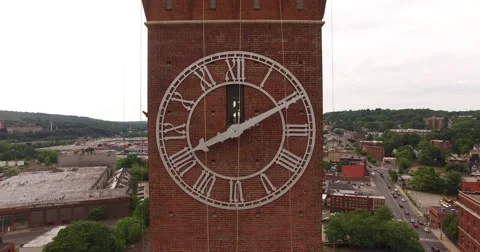 Flying backwards away from a clock tower in 4K Video stock 64832602