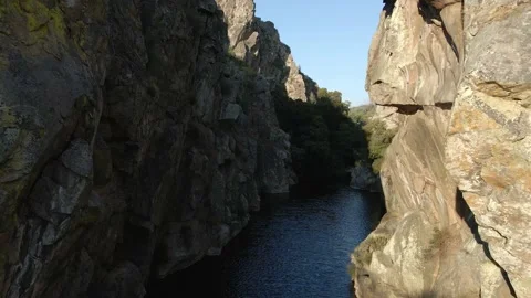 Flying backwards between a canyon of limestone Stock Footage 170557552
