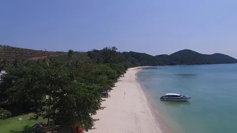 Flying backwards over the beach Stock Footage 80371926