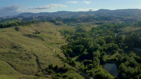 Flying Backwards Over Camel's Back Ridge 4k 動画素材 138050445