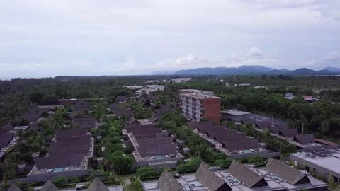 Flying backwards over hotel near beach in Phuket Thailand. Thailand 4K Stock Footage 161067957