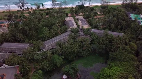Flying backwards over hotel near beach in Phuket Thailand. Thailand 4K Stock Footage 161067997