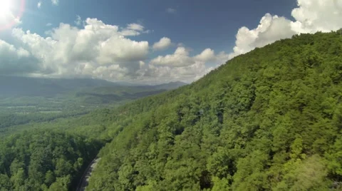 Flying Backwards over Mountains Long 1/2 mile shot Stock Footage 41660577