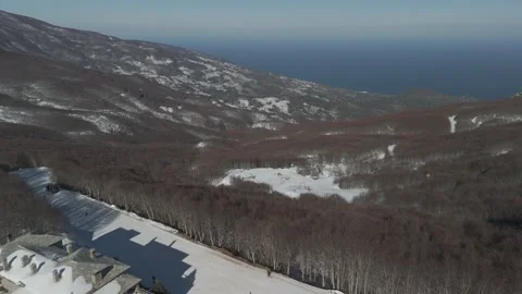 Flying backwards over the Mt. Pelion Ski Centre's Cafe Stock Footage 288710921