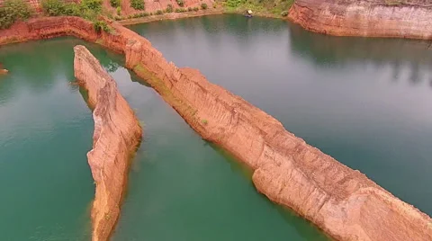 Flying Backwards Over People on Cliff and Swimming on Raft Stock Footage 55288714