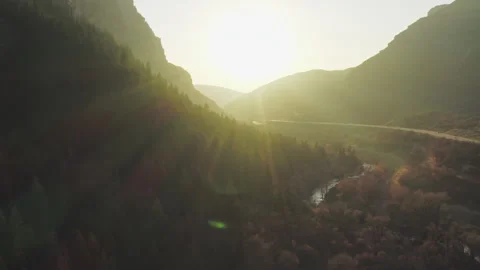 Flying backwards over Provo Canyon mountainside forest, Provo River, Highway Stock-Footage 242825159