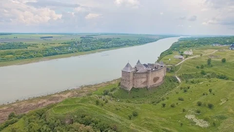Flying backwards revealing nice view of Khotyn Fortress and river Dniester Stock Footage 99480237