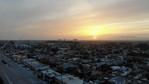 Flying Backwards at Sunset, facing West in Playa Vista, LA - (4K, Drone, DJI) Stock Footage 91196624