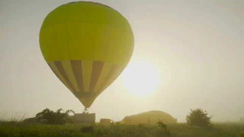 Flying in a balloon in a clear blue sky against the background of the morning Stock Footage 112227538