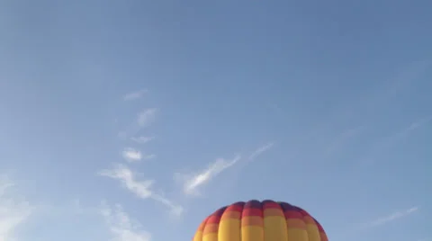 Flying balloon tilt down from sky to fire sky fly heigh California  Stock Footage 35402693