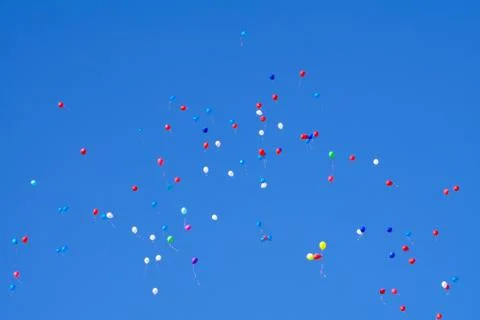 Flying Balloons mid-air objects outdoors play reflexion . 写真素材