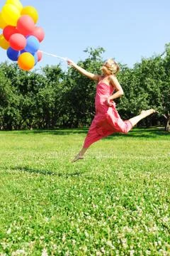 Flying with balloons Stock Photos