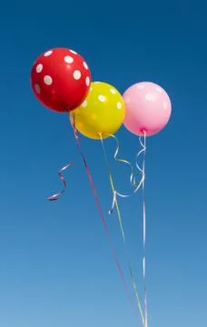 Flying balloons with polka dot Stock Photos