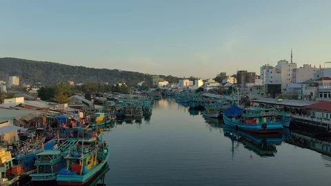 Flying be drone above sea water bay in harbour very close between ships and boat Stock Footage 124366745