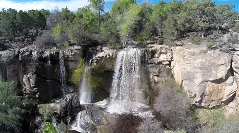 Flying by a beautiful waterfall. Stock Footage 53274699