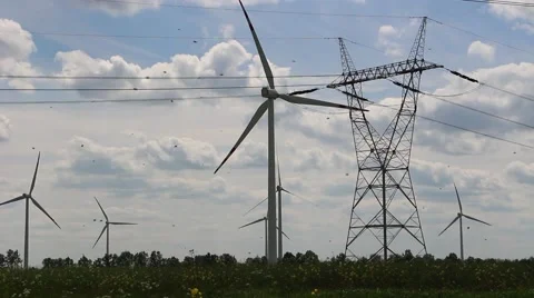 Flying bees against wind farm Stock Footage 50858789