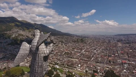 Flying behind the Statue of the Virgin overlooking Quito, Ecuador Stock Footage