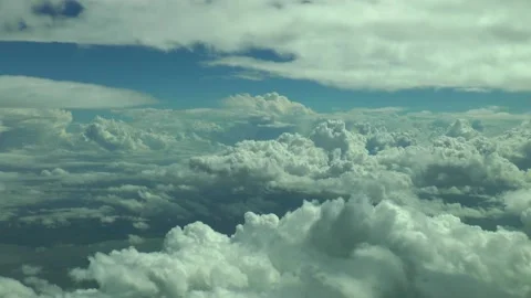 Flying in between the clouds, aerial footage. Video stock 163771063