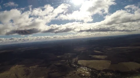 Flying between clouds and earth Stock Footage 75614474