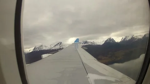 Flying between mountains over the sea Stock Footage 42454452