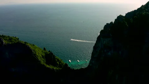 Flying between mountains in the sea on Phi Phi Island Stock Footage 232230953