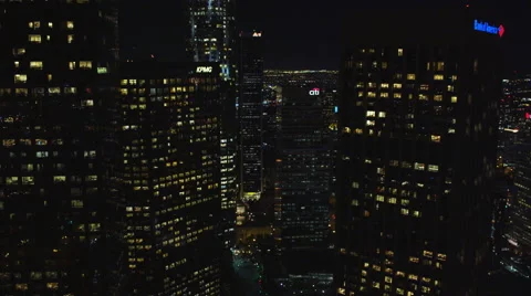 Flying between skyscrapers in downtown Los Angeles at night. Shot in October Stock Footage