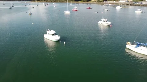 Flying between the small Yachts in Killyleagh Harbour on Strangford Lough Stock Footage 209145973