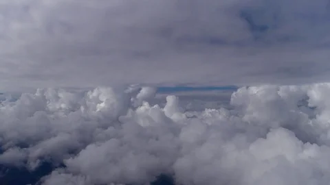 Flying between two layers of clouds Stock Footage 75723677