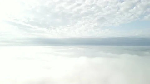 Flying between two layers of clouds. Hovering above the clouds. Stock Footage 234636998