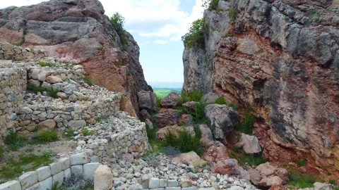 Flying between two Rocks, Hittites, Hattusa Stock Footage 247964289