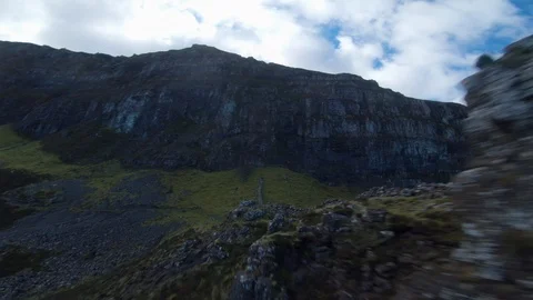 Flying like a bird close over rocks drone aerial 4K Stock Footage 104577269
