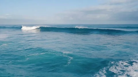 Flying of Blue Ocean Wave Breaking Stock Footage 56585767