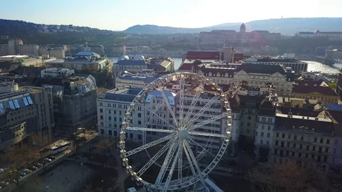 Flying by Budapest Eye at Deak Square with Buda Castle Royal Palace Stock Footage 88858821