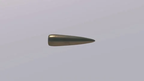 A flying bullet on a gray background Stock Footage 158994726