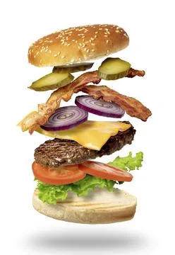 Flying burger isolated on a white background Stock Photos