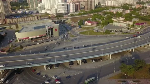 A flying camera captures the heights of an overpass with cars. Stock Footage 137620262