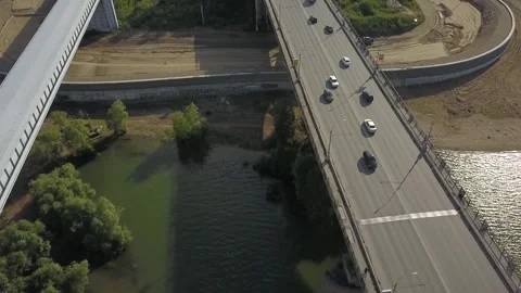Flying camera captures the heights of an overpass with cars. Stock Footage 137620266