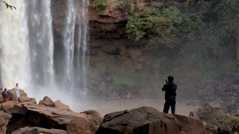 A flying camera captures a waterfall in Vietnam Stock Footage 123425808