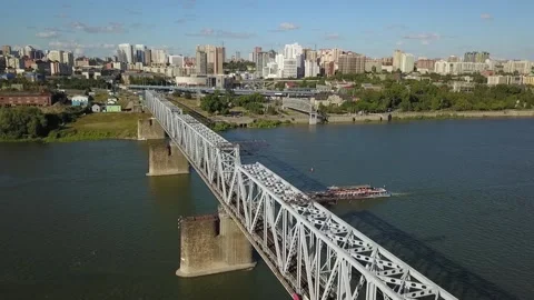 The flying camera chases the boat on the river. Stock Footage 138854425