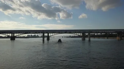 A flying camera chases a passenger boat on the ob river in siberia Stock Footage 138881541