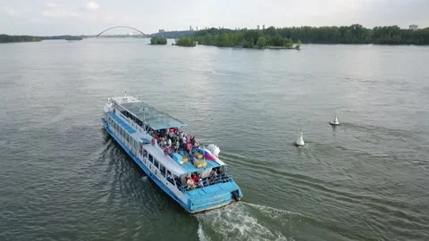 A flying camera chases a passenger boat on the ob river in siberia Stock Footage 138881691