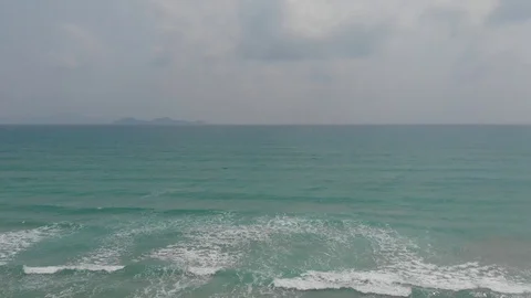 Flying camera flies over a beautiful beach overlooking the waves, Vietnam Stock-Footage 116120405