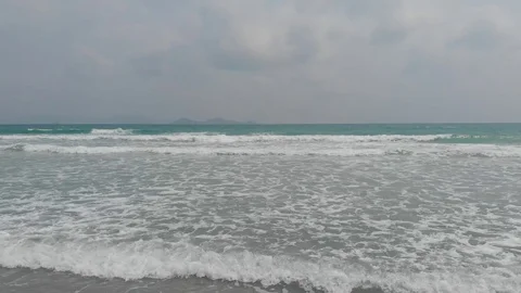 Flying camera flies over a beautiful beach overlooking the waves, Vietnam Stock-Footage 116120491