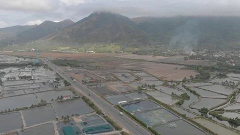 A flying camera flies over the fields that are flooded with water Stock Footage 117432771