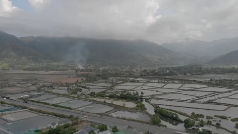 A flying camera flies over the fields that are flooded with water Stock Footage 117432783